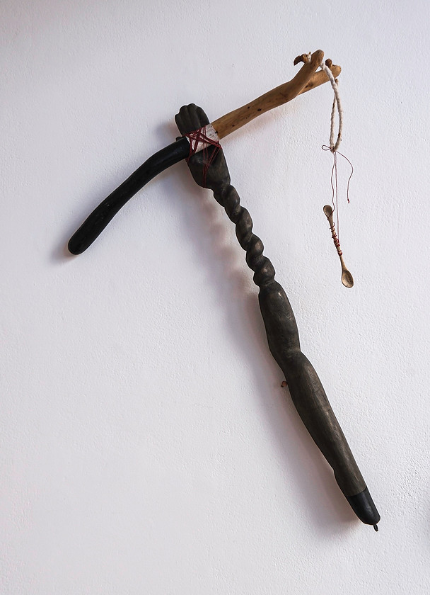 schnake_ann_HandSlingshotSpoon1_ 36inches x 18 x 4_ wood, string, pigment, paint_ 2023.jpg
